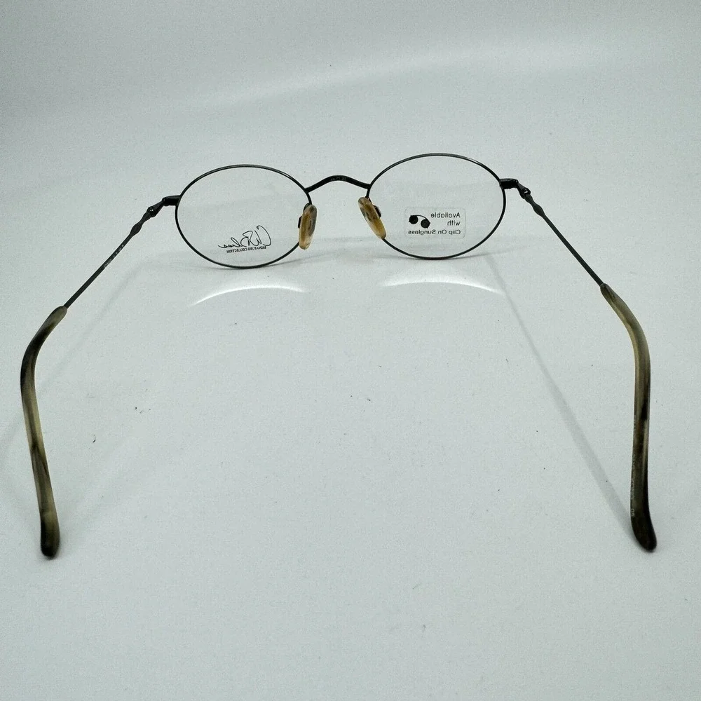 Kenmark Eyeglasses Frames Gallery‎ Silver Round Tortoise 49-20-140 H11133